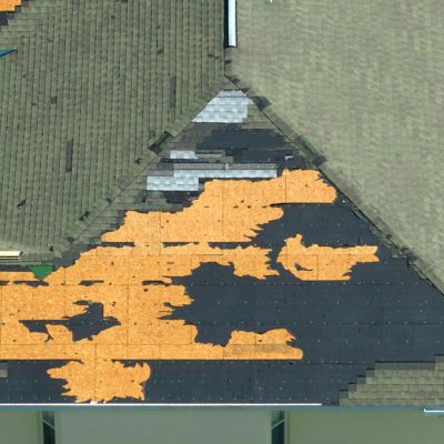 Alan's Roofing reroofing blog: roof section with bare decking and underlayment showing