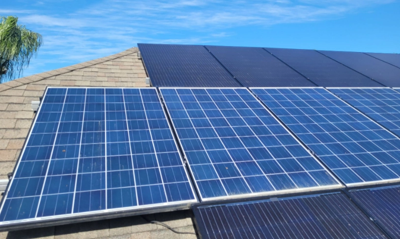 Solar panels installed on a residential home in Central Florida installed by the local roofing company; Alan's Roofing.