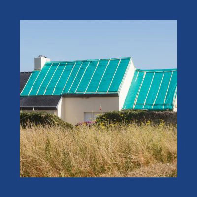 Alans hurricane damaged roof with tarp (1)